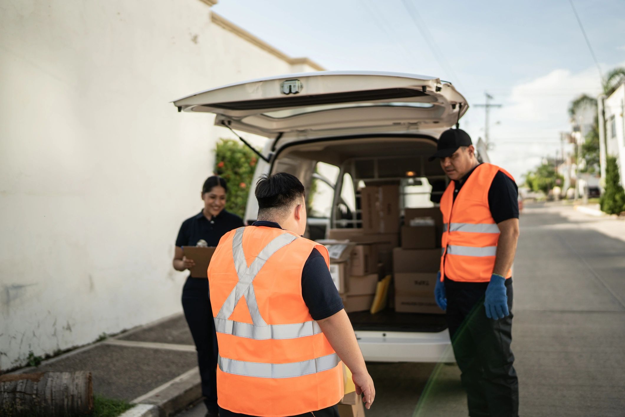 Crew preparing a vehicle and equipment for a move