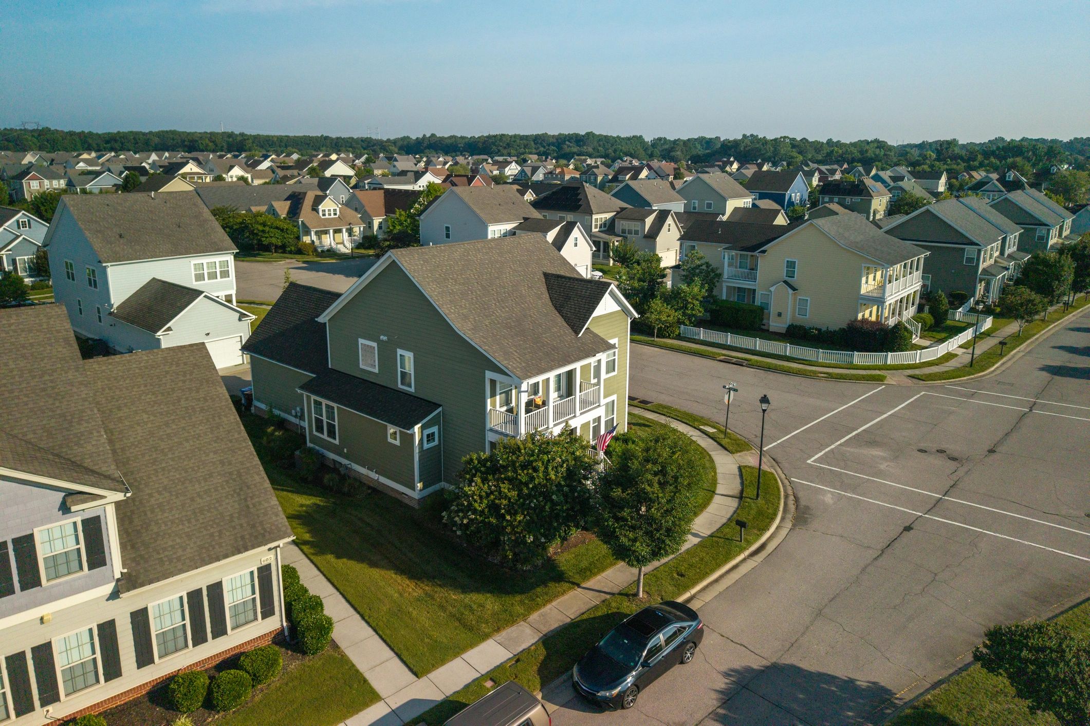 Residential neighborhood homes with well-kept lawns
